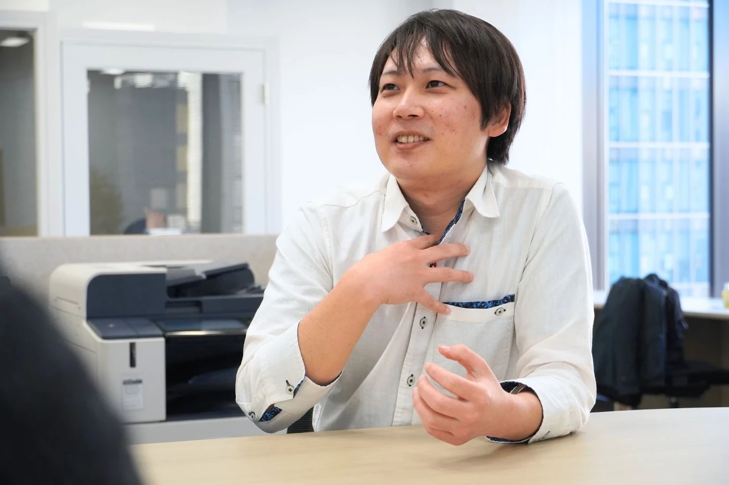 自身について語る若手男性社員（玉利さん）